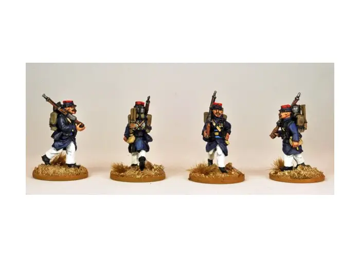 Marching Legion in uncovered Kepi with backpack.